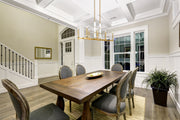 Kaden 8 Light 44" Linear Pendant in Modern Gold in a room setting