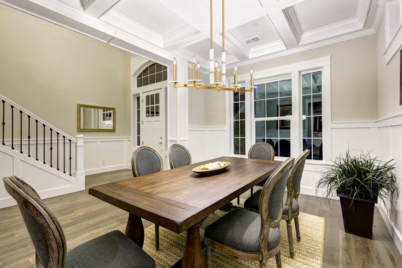Kaden 8 Light 44" Linear Pendant in Modern Gold in a room setting