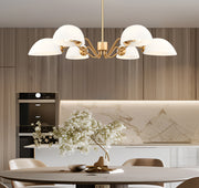 Breton 6 Light 39" Chandelier in Modern Gold in a room setting