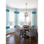 Capri 5 Light 24" Chandelier in Raw Steel in a room setting
