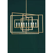 Capri 9 Light 39" Chandelier in Antique Gold in a room setting