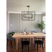 Capri 9 Light 39" Chandelier in Raw Steel in a room setting