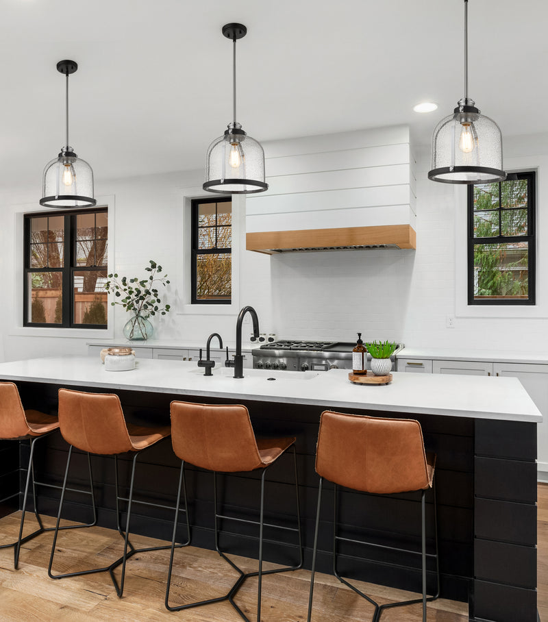 Burren 1 Light 12.25" Pendant in Matte Black + Chrome in a room setting
