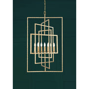Capri 7 Light 24" Chandelier in Antique Gold in a room setting