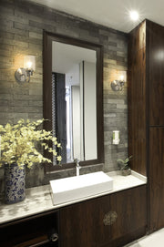 Kinsley 1 Light 5.25" Wall Sconce in Brushed Nickel in a room setting
