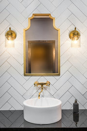 Kinsley 1 Light 5.25" Wall Sconce in Heirloom Gold in a room setting