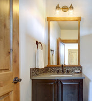 Kinsley 2 Light 14.5" Vanity in Heirloom Gold in a room setting