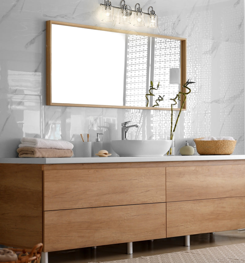 Kinsley 4 Light 28" Vanity in Brushed Nickel in a room setting
