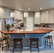 Kinsley 1 Light 8" Pendant in Brushed Nickel in a room setting