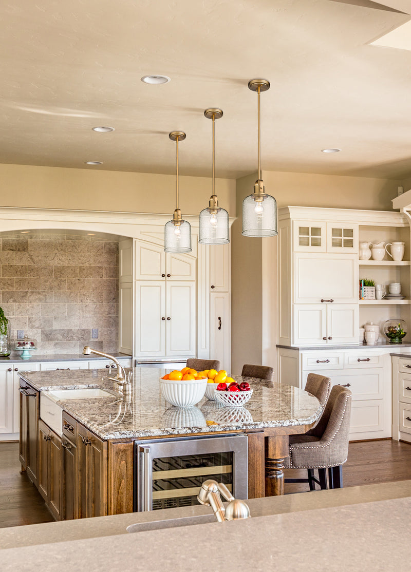 Kinsley 1 Light 8" Pendant in Heirloom Gold in a room setting