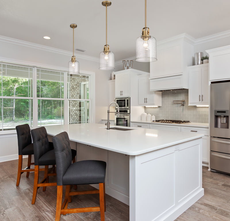 Kinsley 1 Light 8" Pendant in Heirloom Gold in a room setting