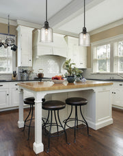 Kinsley 1 Light 8" Pendant in Matte Black in a room setting