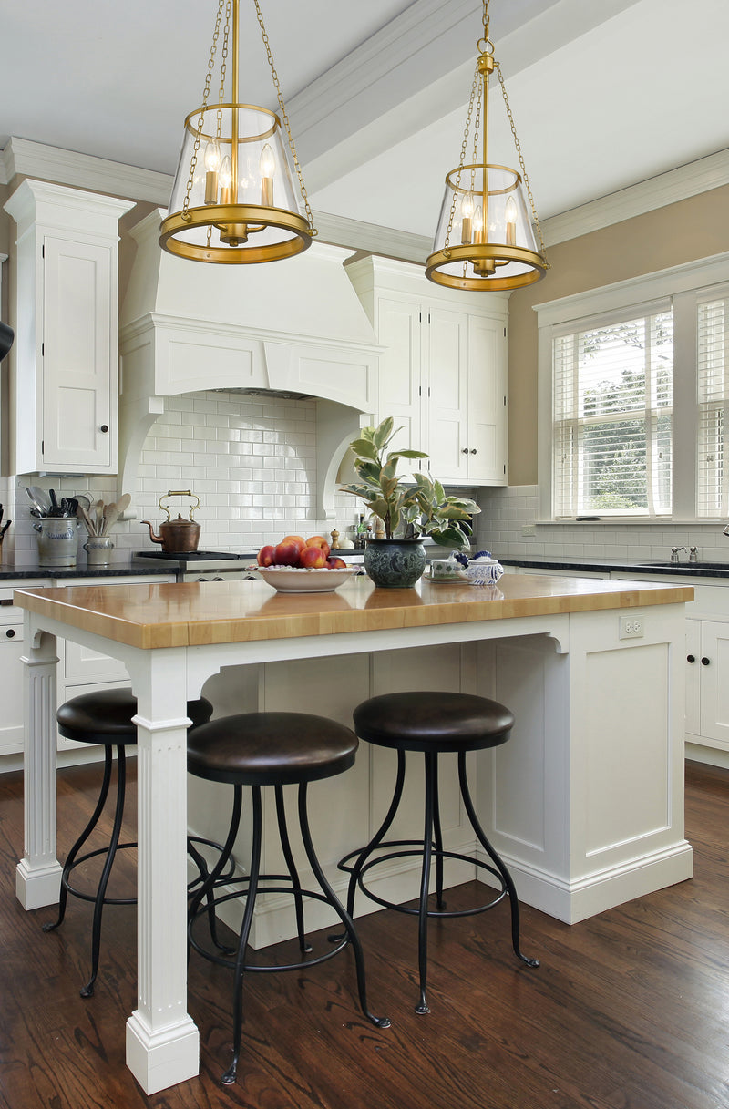 Prescott 3 Light 12" Pendant in Rubbed Brass in a room setting