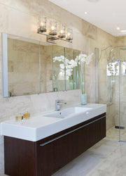 Archer 4 Light 32.75" Vanity in Brushed Nickel in a room setting