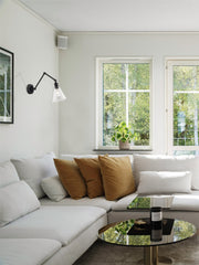 Gayson 1 Light 7.75" Wall Sconce in Matte Black in a room setting