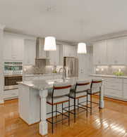 Weston 5 Light 18" Pendant, White Linen Shade in Brushed Nickel in a room setting
