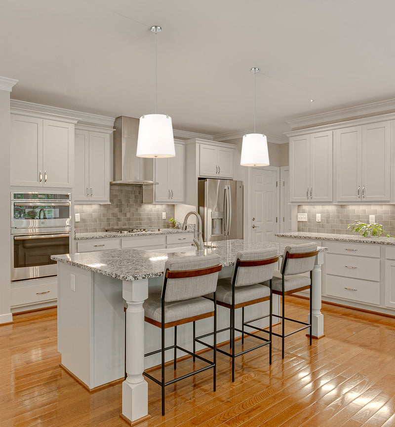 Weston 5 Light 18" Pendant, White Linen Shade in Brushed Nickel in a room setting