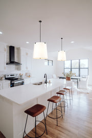 Weston 6 Light 24" Pendant, White Linen Shade in Matte Black in a room setting