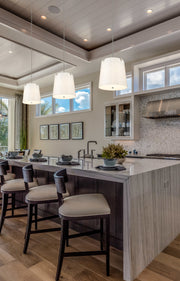 Weston 5 Light 18" Pendant, Cream Shade in Brushed Nickel in a room setting