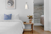 Julia 1 Light 5.25" Wall Sconce in Brushed Nickel in a room setting