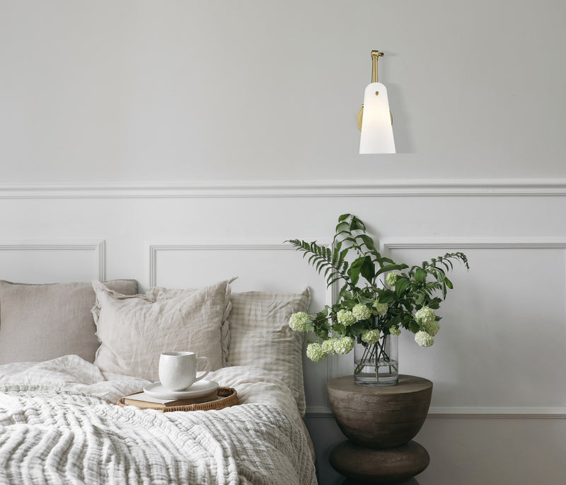 Julia 1 Light 5.25" Wall Sconce in Modern Gold in a room setting