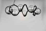 Curlicue 8 Light Chandelier in Black / Polished Nickel