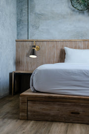 Soriano 1 Light 6.25" Wall Sconce in Matte Black in a room setting