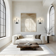 Allistair 3 Light 15" Wall Sconce in Matte Black in a room setting