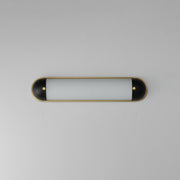 Capsule 24" LED Bath Vanity Light in Black / Natural Aged Brass