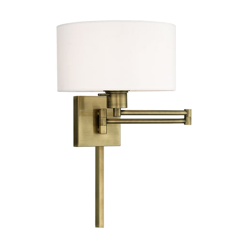Swing Arm Wall Lamp with 11" Shade in Antique Brass