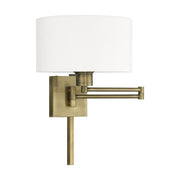Swing Arm Wall Lamp with 11" Shade in Antique Brass
