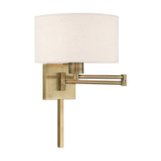 Swing Arm Wall Lamp with 11" Shade in Antique Brass