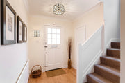 Eternity 2 Light 9.75" Wall Sconce in Chrome in a room setting
