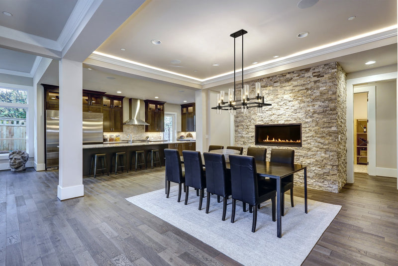 Datus 10 Light 42.5" Linear Pendant in Matte Black in a room setting