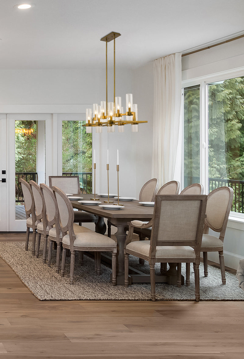 Datus 10 Light 42.5" Linear Pendant in Rubbed Brass in a room setting