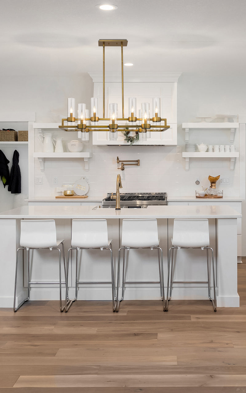 Datus 10 Light 42.5" Linear Pendant in Rubbed Brass in a room setting