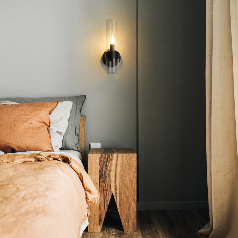 Datus 1 Light 4.75" Wall Sconce in Matte Black in a room setting