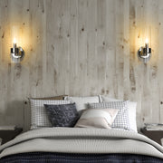 Datus 1 Light 4.75" Wall Sconce in Polished Nickel in a room setting