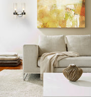 Datus 2 Light 10.25" Wall Sconce in Polished Nickel in a room setting