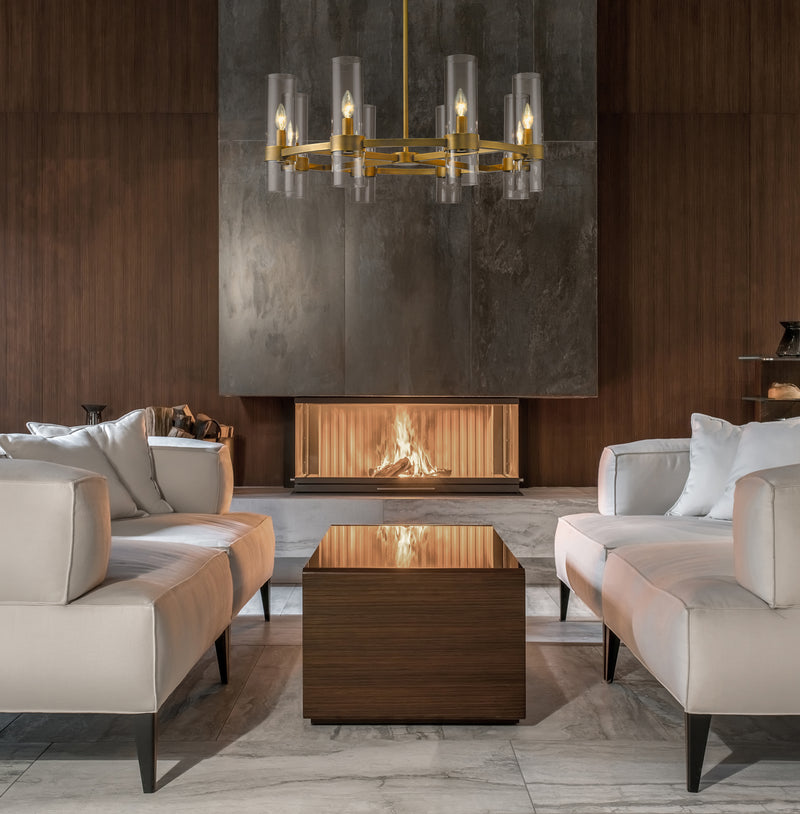 Datus 8 Light 32" Chandelier in Rubbed Brass in a room setting