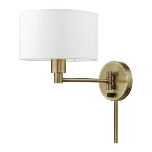 Swing Arm Wall Lamp with 9" Shade in Antique Brass