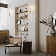 Claudelle 1 Light 5.75" Wall Sconce, 24" Tall in Tundra White + Modern Gold in a room setting