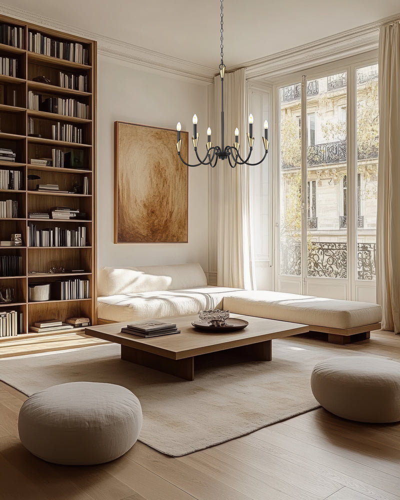 Claudelle 6 Light 32" Chandelier in Matte Black + Modern Gold in a room setting