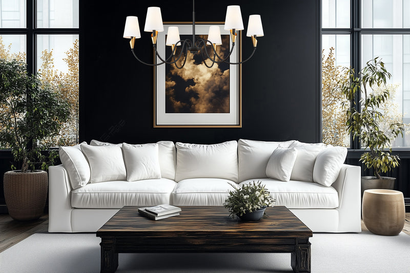 Claudelle 6 Light 46" Chandelier in Matte Black + Modern Gold in a room setting