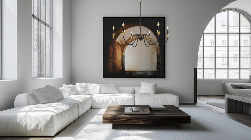 Claudelle 6 Light 46" Chandelier in Matte Black + Modern Gold in a room setting