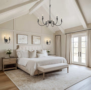 Claudelle 6 Light 46" Chandelier in Matte Black in a room setting