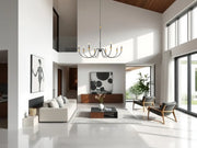 Claudelle 8 Light 65" Chandelier in Matte Black + Modern Gold in a room setting