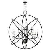 Aria 12-Light Grande Foyer Chandelier in Black with Brushed Nickel Finish Candles