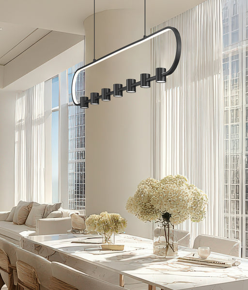 Saros 1 Light 54" Linear Pendant in Matte Black in a room setting
