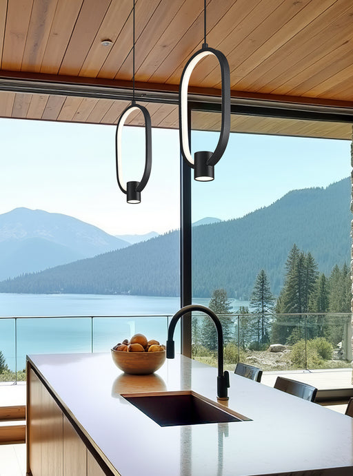 Saros 1 Light 7.25" Pendant in Matte Black in a room setting